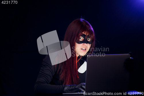 Image of Dangerous hacker in mask close-up