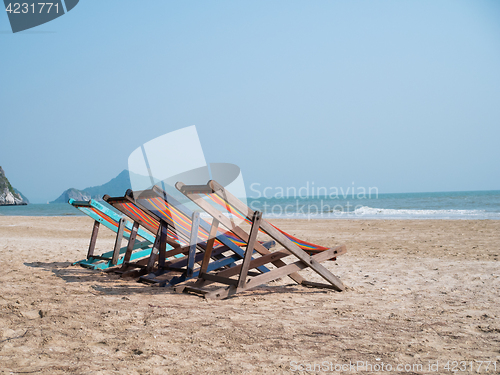 Image of Photo of loungers on beach