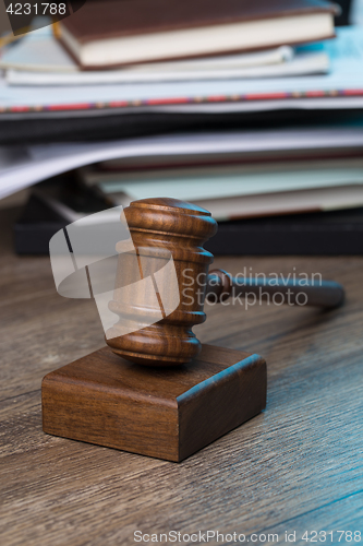 Image of Hammer of judge against folder