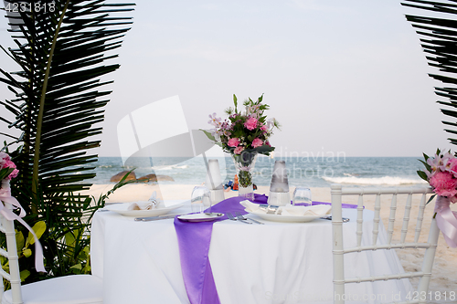 Image of Covered table on sea shore