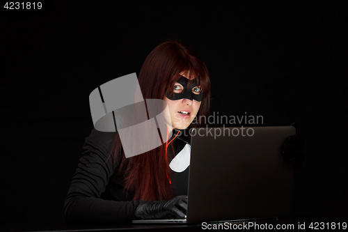 Image of Dangerous woman in mask close-up