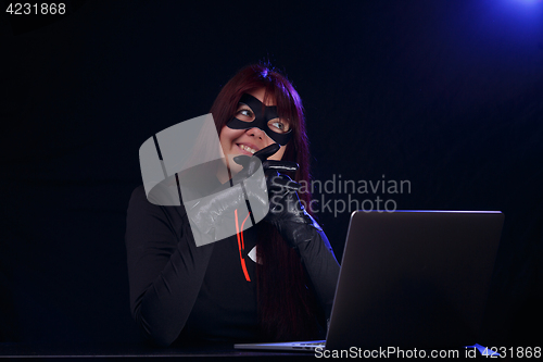 Image of Night hacker in black mask