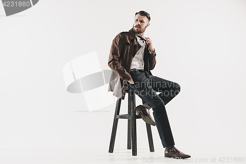 Image of Portrait of stylish handsome young man
