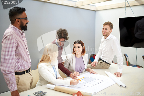 Image of business team discussing house project at office