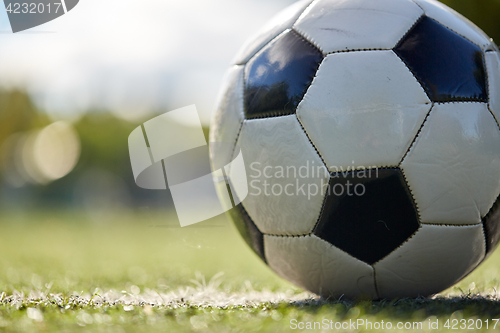 Image of soccer ball on football field