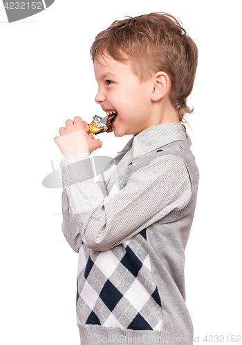 Image of Boy eating chocolate