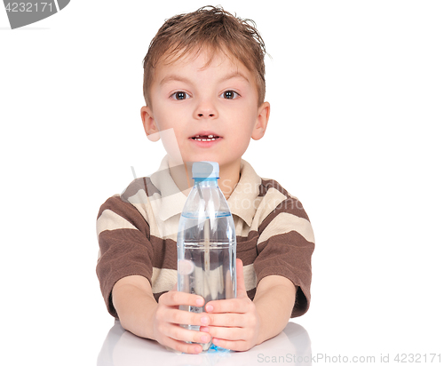 Image of Boy with plastic bottle of water.