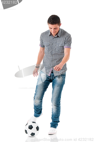 Image of Young man with soccer ball