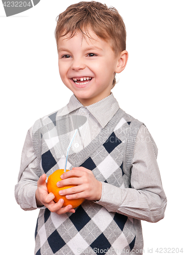 Image of Little boy drinking orange juice