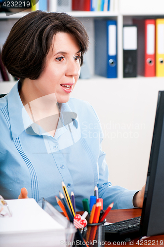Image of Woman working on computer