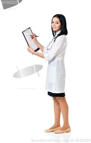 Image of Female doctor holding clipboard