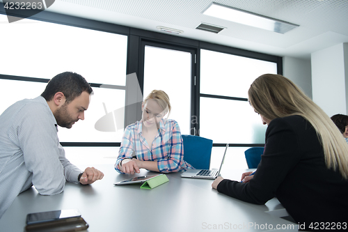 Image of Business Team At A Meeting at modern office building