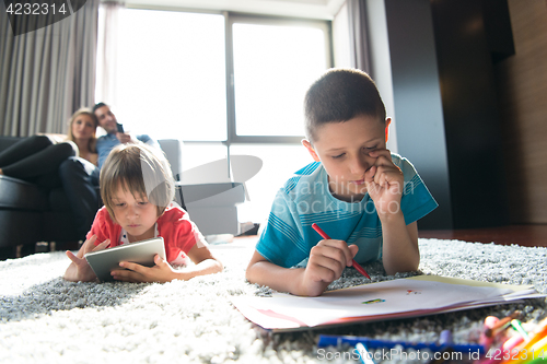 Image of young couple spending time with kids