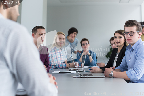 Image of Business Team At A Meeting at modern office building