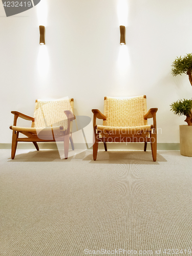 Image of Interior with classic rattan chairs