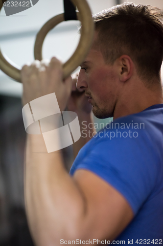 Image of man doing dipping exercise