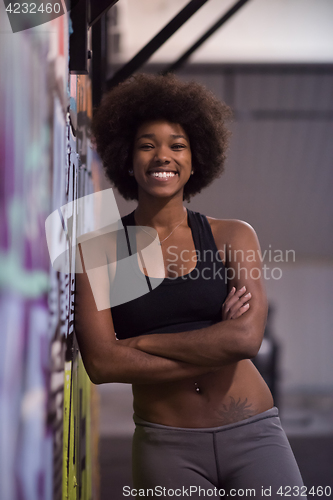 Image of black woman after a workout at the gym