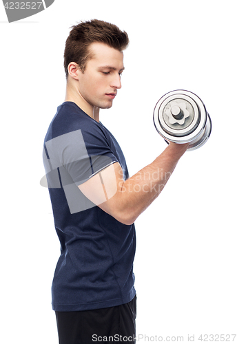 Image of sportive young man with dumbbell