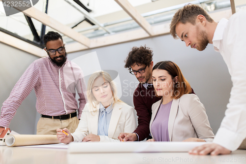 Image of business team discussing house project at office