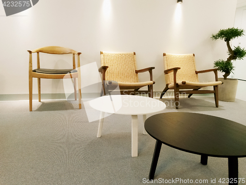 Image of Interior with chairs, table and carpet floor