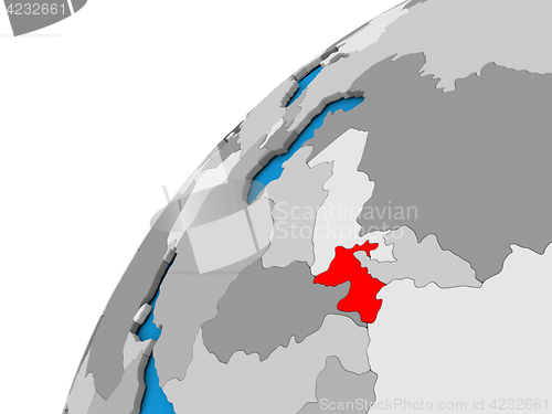 Image of Tajikistan on globe in red