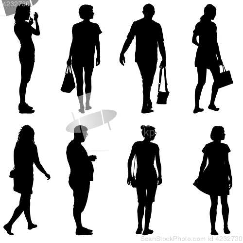 Image of Black silhouette group of people standing in various poses