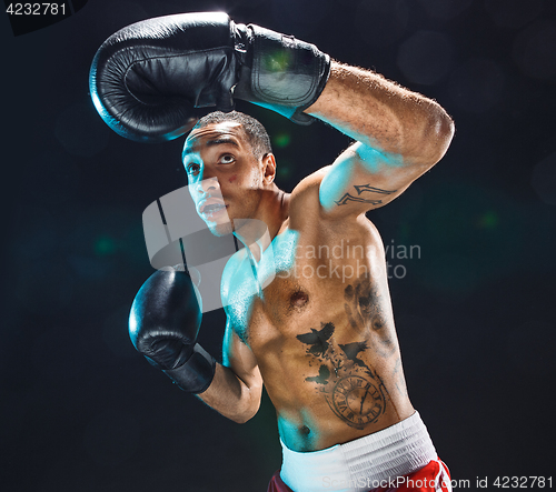 Image of Afro american male boxer.