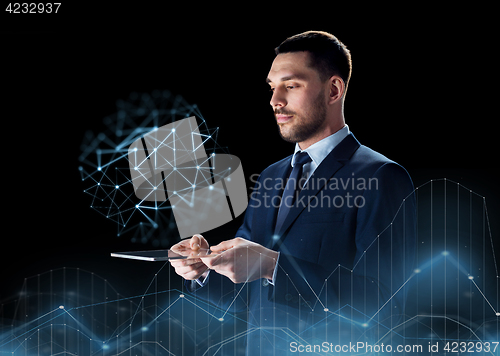 Image of businessman with transparent tablet pc