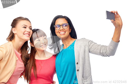 Image of international group of happy women taking selfie
