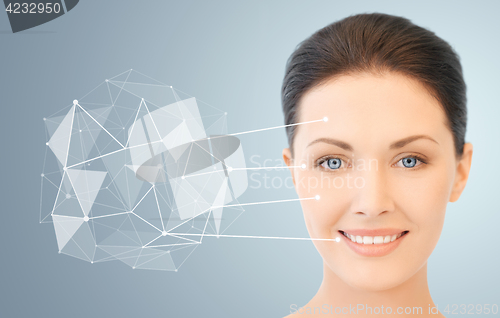 Image of woman face with low poly projection and pointers