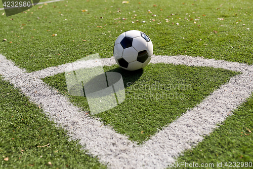 Image of soccer ball on football field