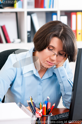 Image of Woman working on computer