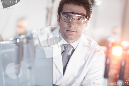 Image of Portrait of an engineer in his working environment.