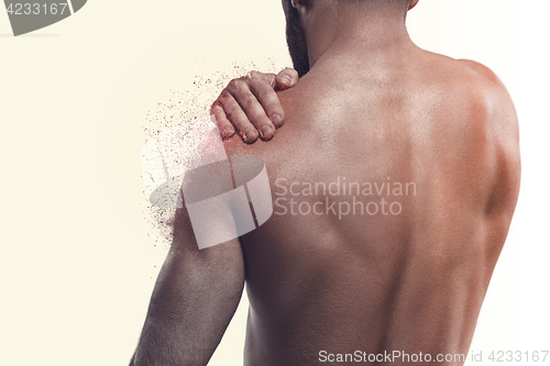 Image of Man with pain in shoulder