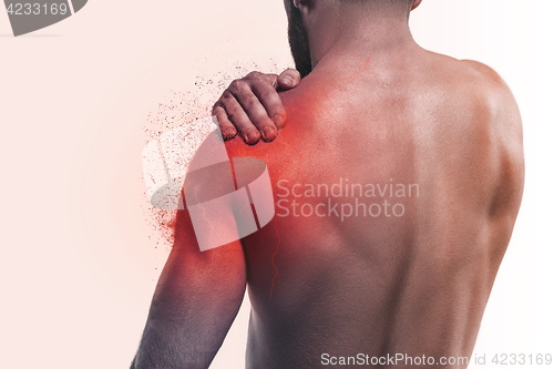 Image of Man with pain in shoulder