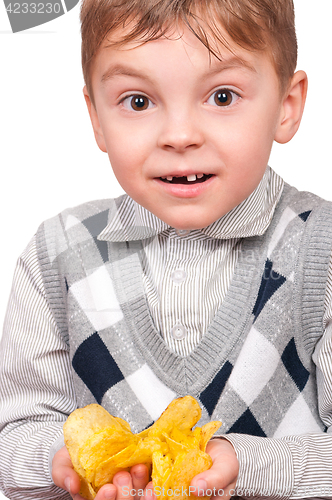 Image of Little boy with packet potato chips