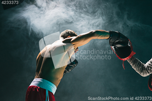 Image of Afro american male boxer.