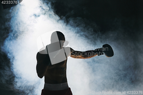 Image of Afro american male boxer.