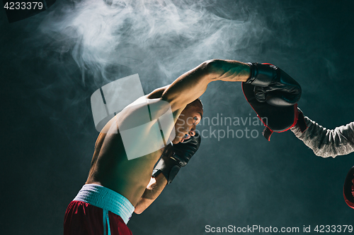 Image of Afro american male boxer.