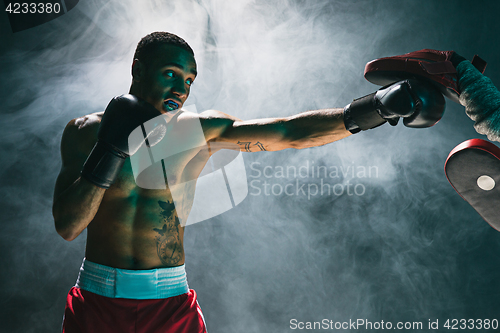 Image of Afro american male boxer.