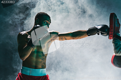 Image of Afro american male boxer.