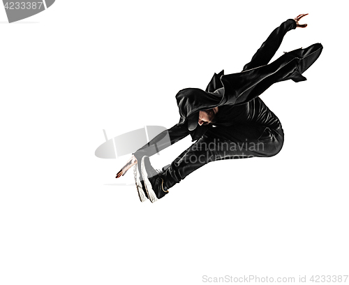 Image of The silhouette of one hip hop male break dancer dancing on white background