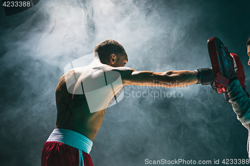 Image of Afro american male boxer.