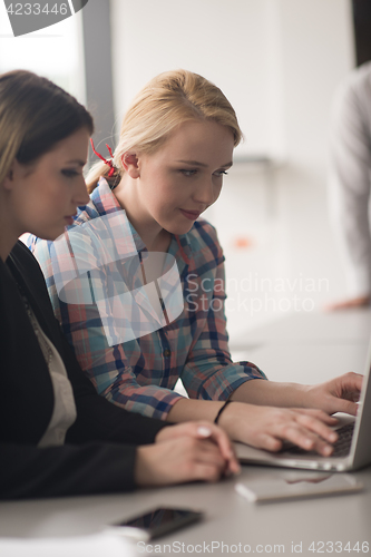 Image of Group of young people meeting in startup office