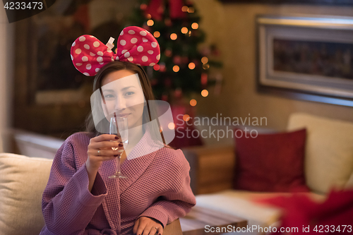Image of woman drinking champagne at spa