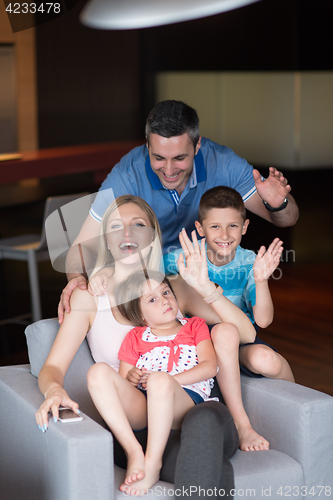 Image of couple spending time with kids