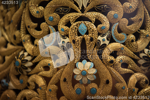 Image of gold jewelry in the shop window