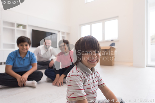 Image of portrait of happy young boys with their dad