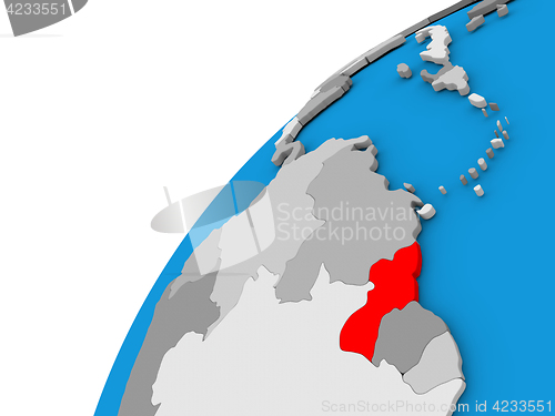 Image of Guyana on globe in red