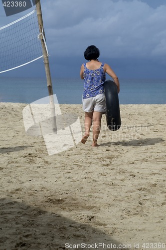 Image of Lone woman on beach